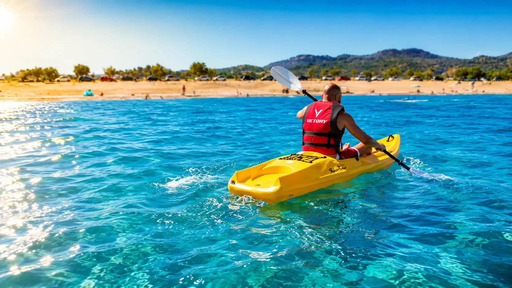 Canoe ready on the shore for paddling at Afandou Beach
